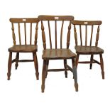 Set of five early 20th century elm and beech child’s chairs, each with stick backs and solid seat