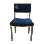 Elizabeth II limed oak Silver Jubilee chair, with back and seat upholstered in velvet, plaque on