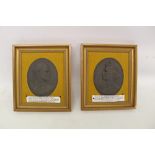 Pair of Black Basalt profile relief plaque by Elliot of Queen Elizabeth II and The Duke of