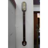 Mahogany stick barometer with visible mercury tube and enclosed bulb, separate thermometer and
