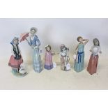 Four Lladro porcelain figures, women holding an umbrella, young girl feeding a goose, two girls