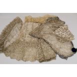 Antique lace and crochet items including dress fronts, boudoir cap, lace and silk collar, Maltese