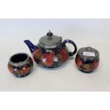 Moorcroft pomegranate teapot and two bowls