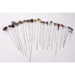 Collection of early 20th century hatpins including silver examples (28)