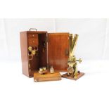 Good 19th century lacquered brass binocular microscope, probably by Ross of London, on tripod base