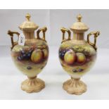Pair of Crown Devon vases and covers with hand painted fruit decoration