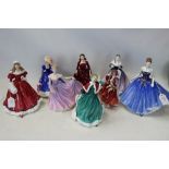 Eight Royal Doulton figures - A Christmas Morning, Top o' the Hill HN1834, Rachel HN3976, Megan