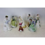 Seven Royal Doulton figures