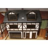 Dolls House Tudor style, unoccupied. Finished in White plaster effect with wooden beams.
