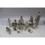 Eight Lladro figures and one other