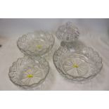Regency cut glass covered bowl and three 19th Century cut glass dishes