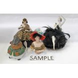 Collection of antique porcelain pin cushion dolls and similar porcelain items including Snowbabies