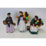 Three Royal Doulton figures - Biddy Pennyfarthing HN1843, The Old Balloon Seller HN1315 and The