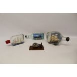 Ships in bottles to include Yarmouth steam drifter, two galleons under sail and a miniature harbour