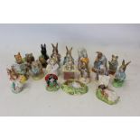 Eighteen Royal Albert Beatrix Potter figures - Foxy Reading, Goody Tiptoes, Mrs Ribby, Mrs Rabbit