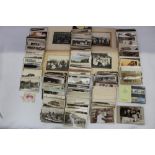 Postcards loose accumulation, many real photographic cards including shop fronts with staff, horses