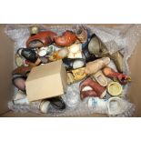 Large collection of assorted souvenir model boots, shoes and clogs.