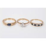 Three gold (9ct) gem set dress rings