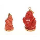 Two gold mounted coral buddah figures