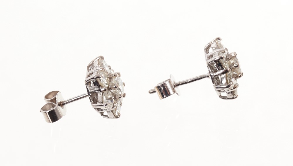 Pair of brilliant cut diamond star shaped cluster stud earrings. Estimated total diamond weight - Image 2 of 2
