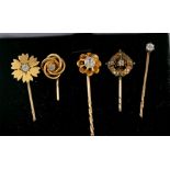 Five Victorian diamond set stick pins