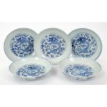 Set five 19th century Chinese blue and white saucer dishes with painted dragon chasing pearl