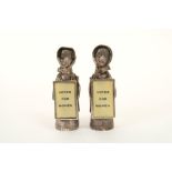 Rare pair of Edwardian silver Suffragette pepperettes.