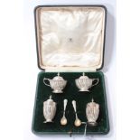 Silver condiment set in fitted case