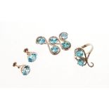 Pair of blue zircon single stone earrings with a round mixed cut blue zircon measuring
