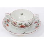 18th century Chelsea Derby trembleuse two handled cup and saucer with polychrome painted floral