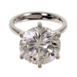 A fine diamond single stone ring with a brilliant cut diamond weighing 10.83 carats, accompanied by