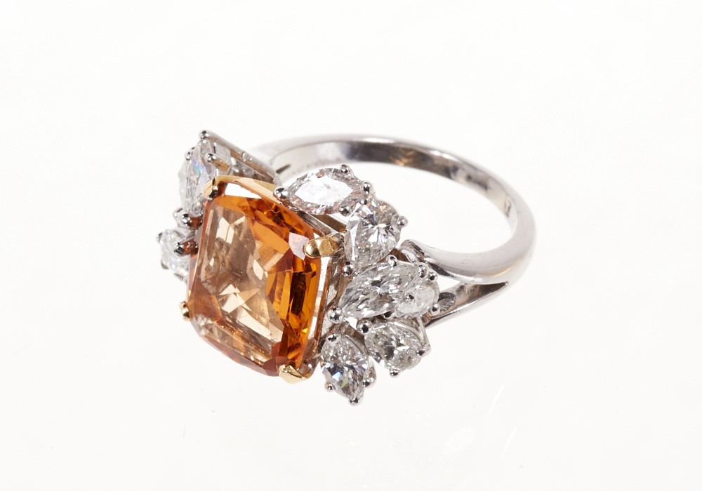 Topaz and diamond cluster cocktail ring