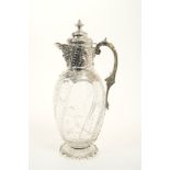 Victorian silver mounted clear glass claret jug with "rock crystal" decoration