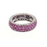 Diamond and gem-set ring with a pavé set band of pink stones with brilliant cut diamonds to the