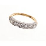 Half diamond and gold eternity band