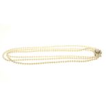 Cultured freshwater pearl three strand necklace with three strings of 4.5mm cultured pearl on a 9ct