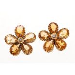 Pair of Georgian style citrine flower earrings, each with pear cut citrine petals in gold setting.
