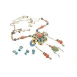 Antique large coral bead necklace with enamelled centre piece - total length 17 inches - together