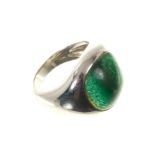 Green cabochon stone ring in white gold setting