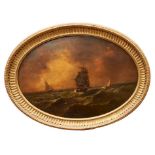 John Moore of Ipswich oval oil on panel - shipping at dusk, signed, in oval gilt frame, 32cm x 45cm