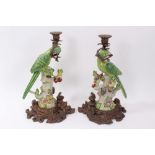 Pair of 19th century-style parrot candlesticks with gilt metal mounts