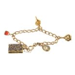 Victorian gold charm bracelet with a collection of five charms to include a Victorian gold and blue