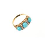 Late Victorian gold turquoise and diamond ring with three oval turquoise cabochons interspaced by