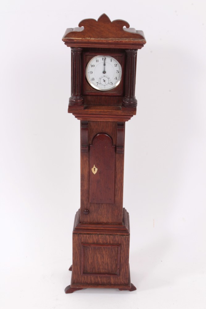 19th century oak pocket watch holder in the form of a miniature longcase clock