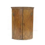 George I red walnut crossbanded hanging corner cabinet