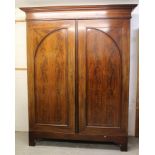 Large early 19th century mahogany and barber-pole strung armoire