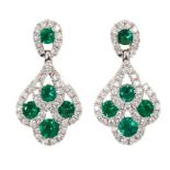 Pair of emerald and diamond pendant earrings in 18ct white gold setting