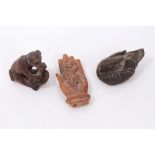 Three Japanese carved wooden netsukes