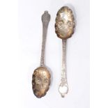 Pair of William IV Britannia Standard silver dog-nose spoons with later embossed decoration