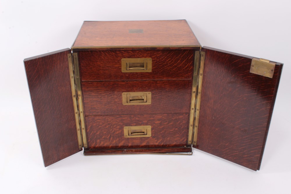 Late 19th century brown oak and brass mounted collectors cabinet